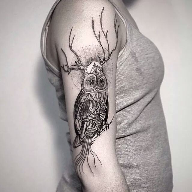 Beautiful looking colored shoulder tattoo of owl with deer horns