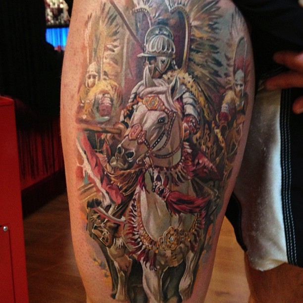 Beautiful looking colored thigh tattoo of illustrative medieval knight horse rider