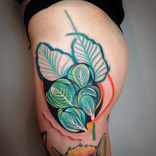 Beautiful looking colored thigh tattoo of incredible flowers