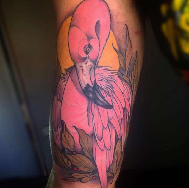 Beautiful looking pink colored arm tattoo of flamingo bird