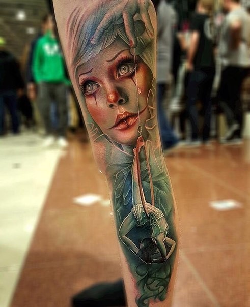 Beautiful new school style colored leg tattoo of woman with acrobat