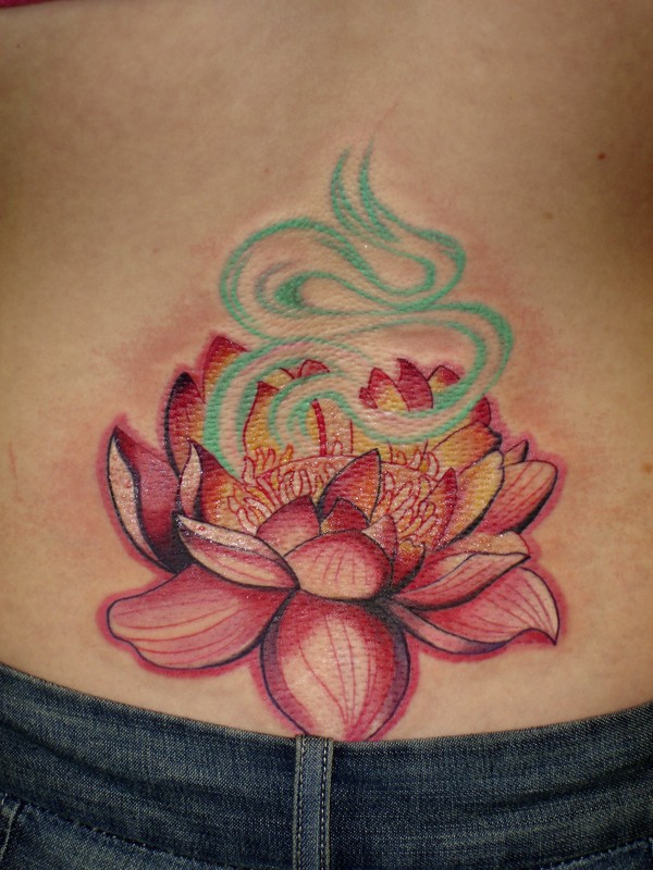Beautiful orange lotus tattoo