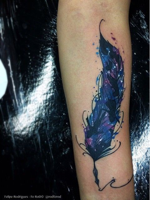 Beautiful painted and colored arm tattoo of feather with stars