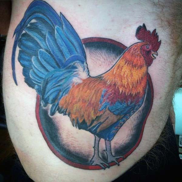 Beautiful painted and colored big cock tattoo on side