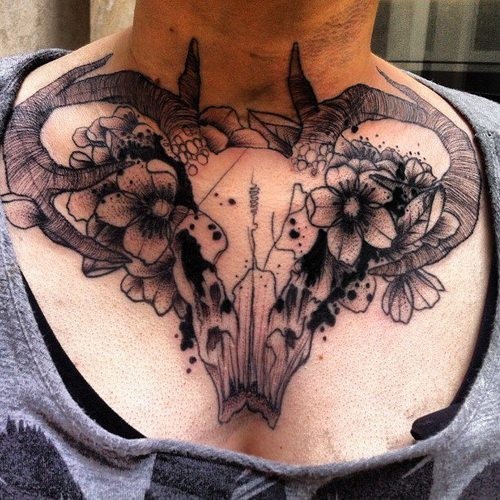 Beautiful ram tattoo on collarbone