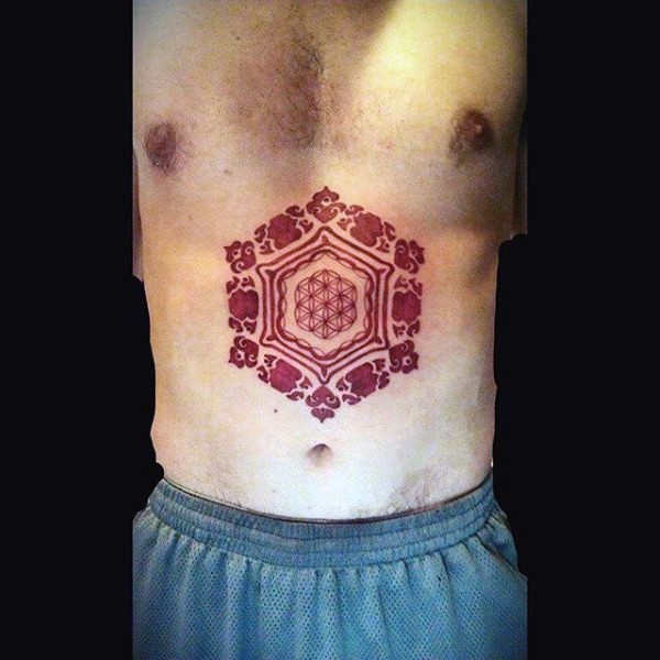 Beautiful red ink style medium sized chest tattoo of ornamental flower