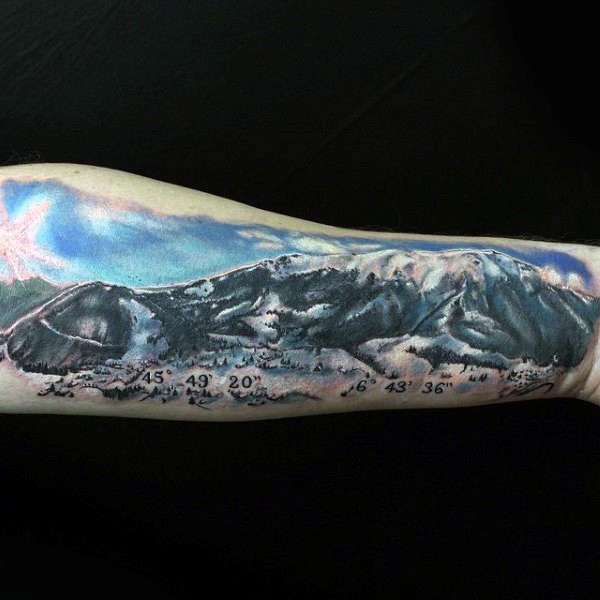Beautiful style colored arm tattoo of various mountains