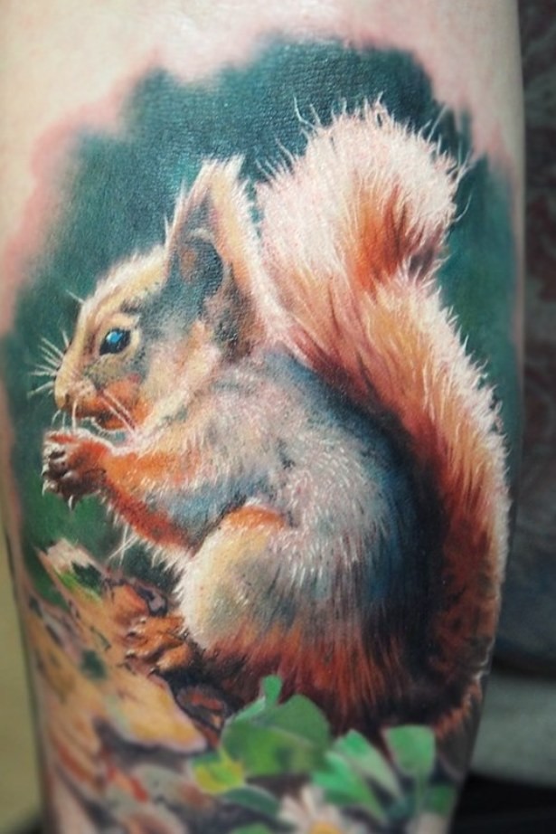 Beautiful tattoo squirrel on hand