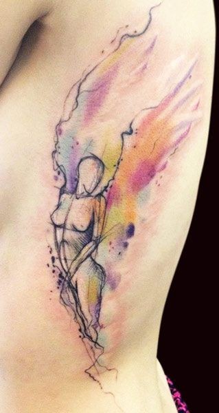 Beautiful watercolor women tattoo on ribs by adam kremer