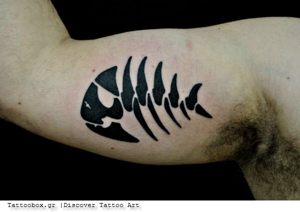 Biceps tattoo dark black ink fish skeleton