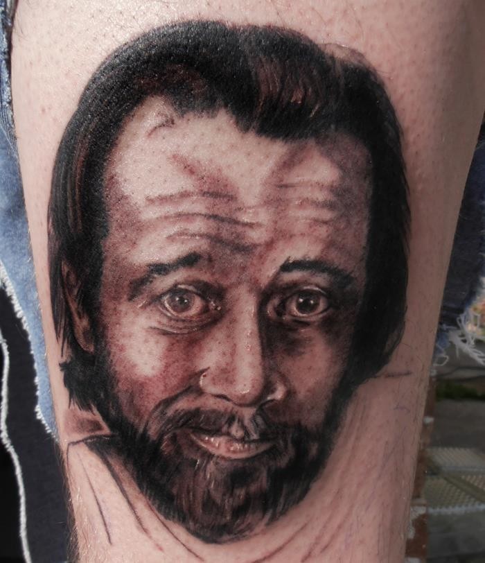 Big 3D like colored famous star portrait tattoo on thigh