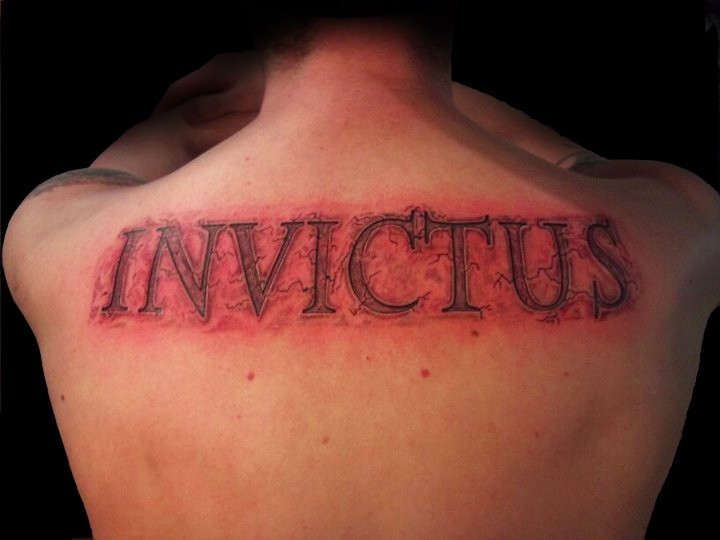 Big 3D like very detailed antic lettering tattoo on upper back