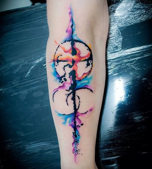 Big abstract style colorful mystical ornaments tattoo on forearm