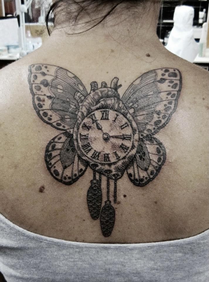 Big Amazing Looking Upper Back Tattoo Of Butterfly Wings With Human