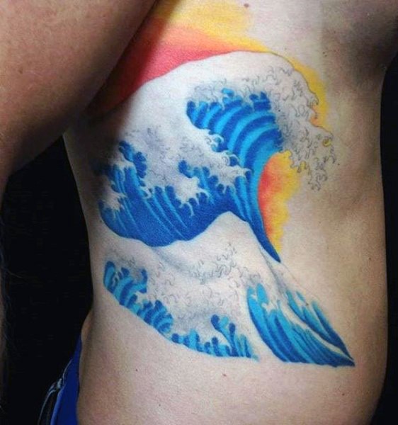 Big beautiful colored wave tattoo on side