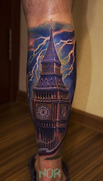 Big Ben and flashes on background naturally colored tattoo on calf in realism style