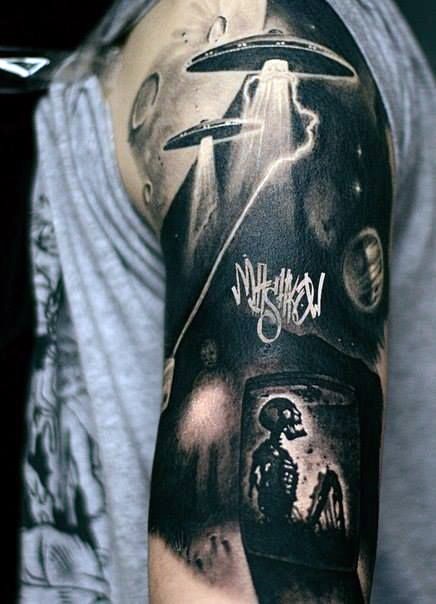 Big black and white alien ships with human skeleton half sleeve tattoo