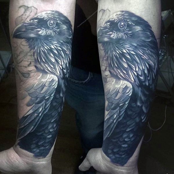 Big black and white detailed crow tattoo on arm