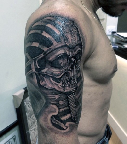 Big black and white Egypt creepy skeleton statue tattoo on shoulder zone