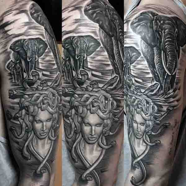 Big black and white evil Medusa with elephants tattoo on sleeve