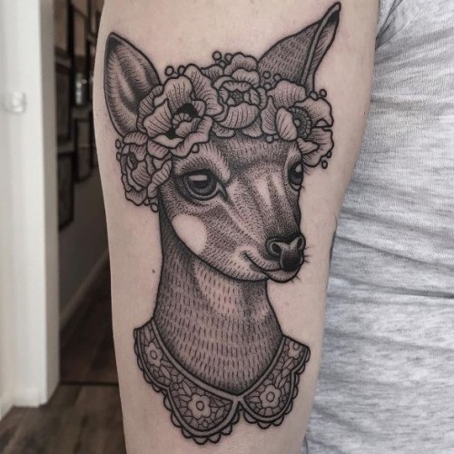 Big black and white funny shoulder tattoo of human like deer with flowers