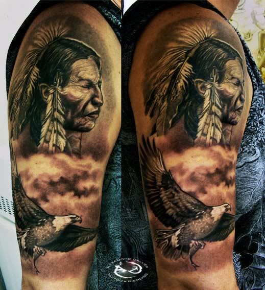 Big black and white old Indian tattoo on half sleeve with flying eagle