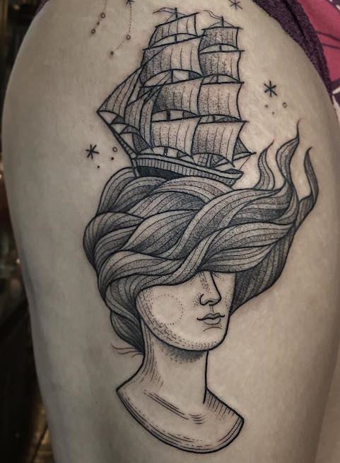 Big black and white on thigh tattoo of mystical woman with sailing ship