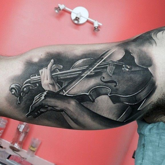 Big black and white realistic violin tattoo on arm