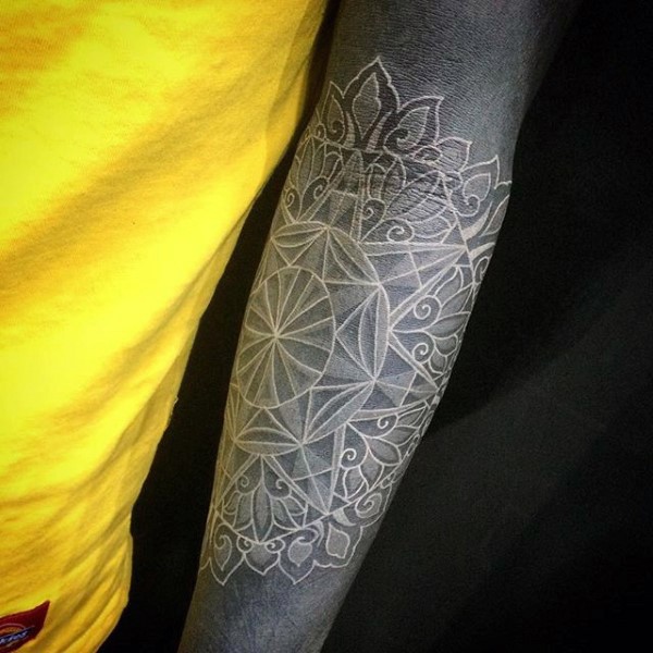 Big black and white tribal flower tattoo on arm