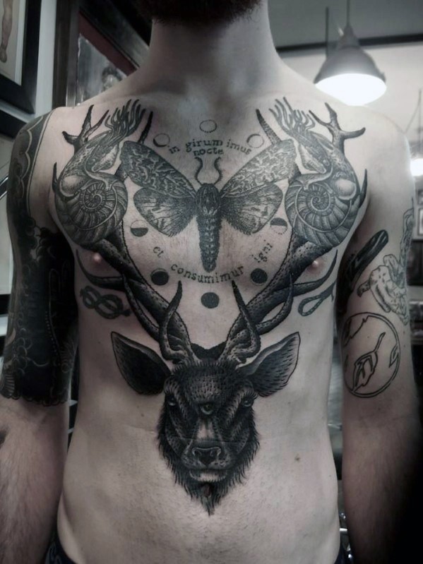 Big black and white various detailed animals tattoo on chest