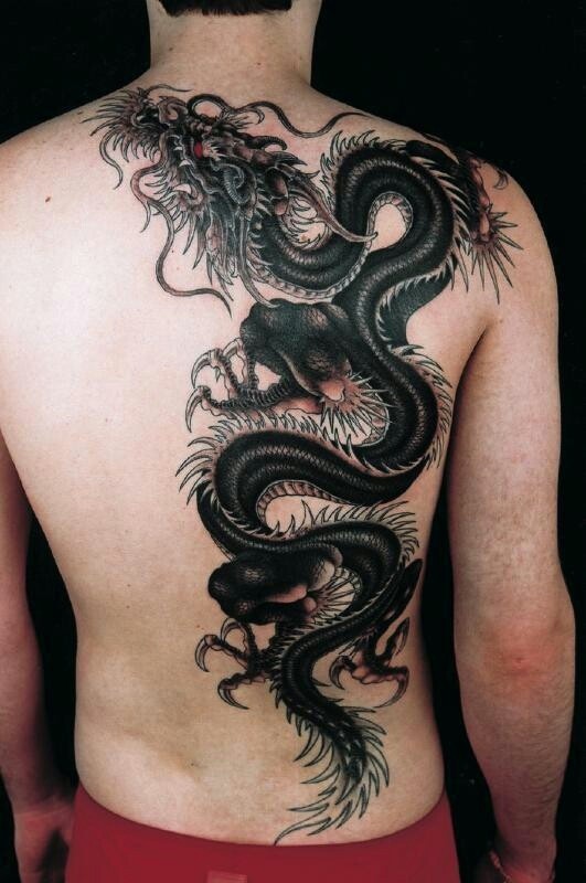Big black dragon tattoo on back