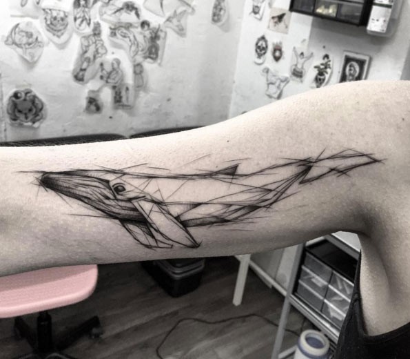 Big black ink arm tattoo of whale sketch
