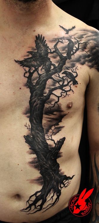 Big black ink dramatic half chest and belly tattoo of lonely dark tree with crows