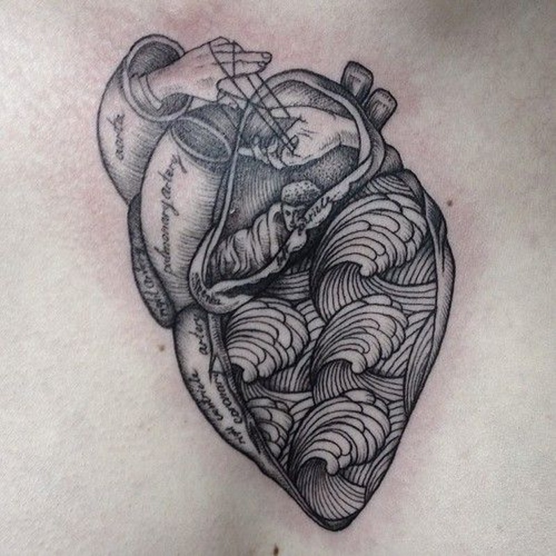 Big black ink fragmented heart with lettering tattoo on hip