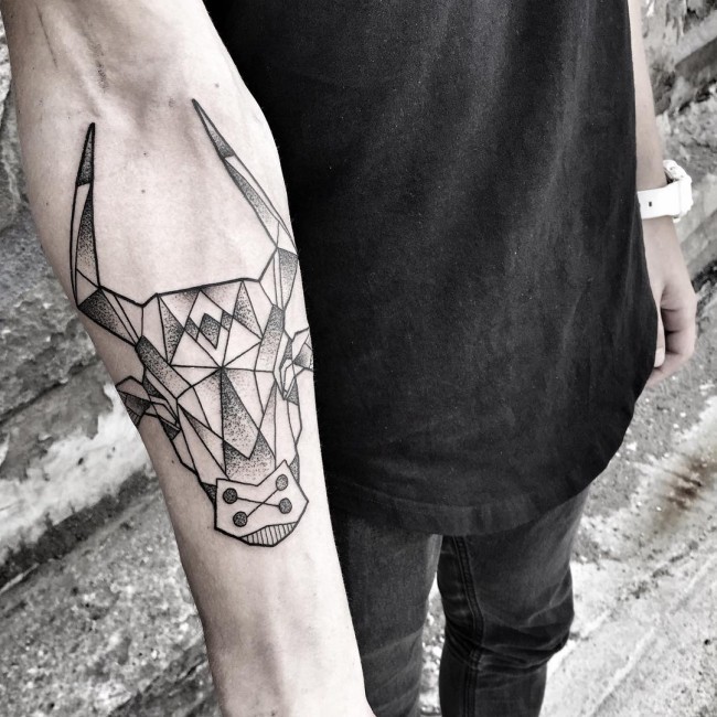 Big black ink geometrical style black ink forearm tattoo of bulls head