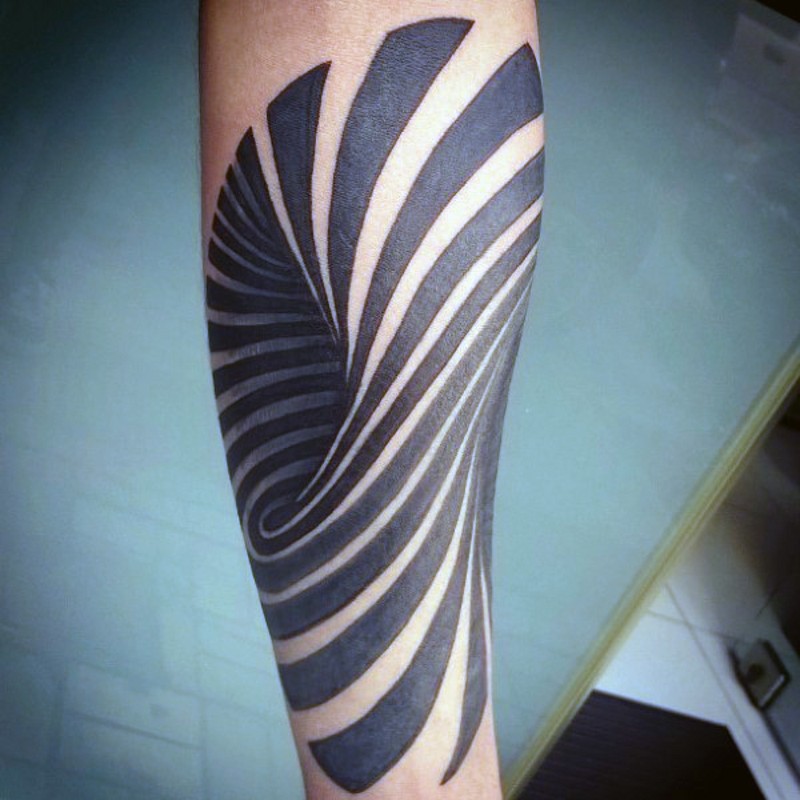 Big black ink hypnotic ornament tattoo on arm