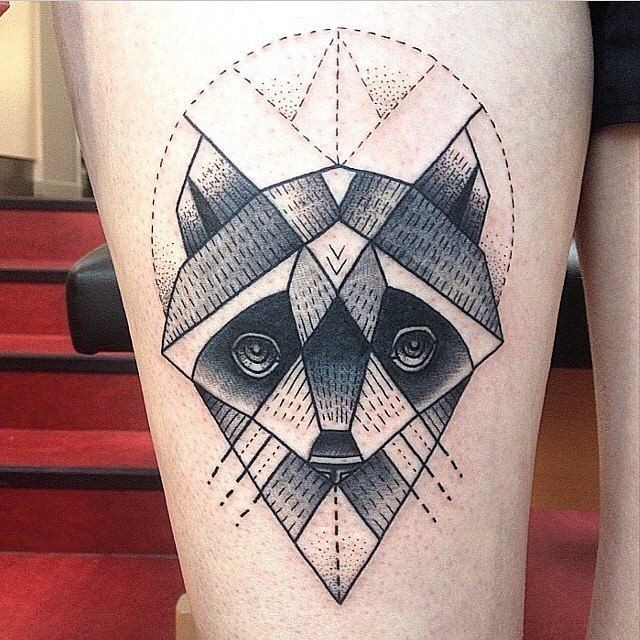 Big black ink line style thigh tattoo of raccoon