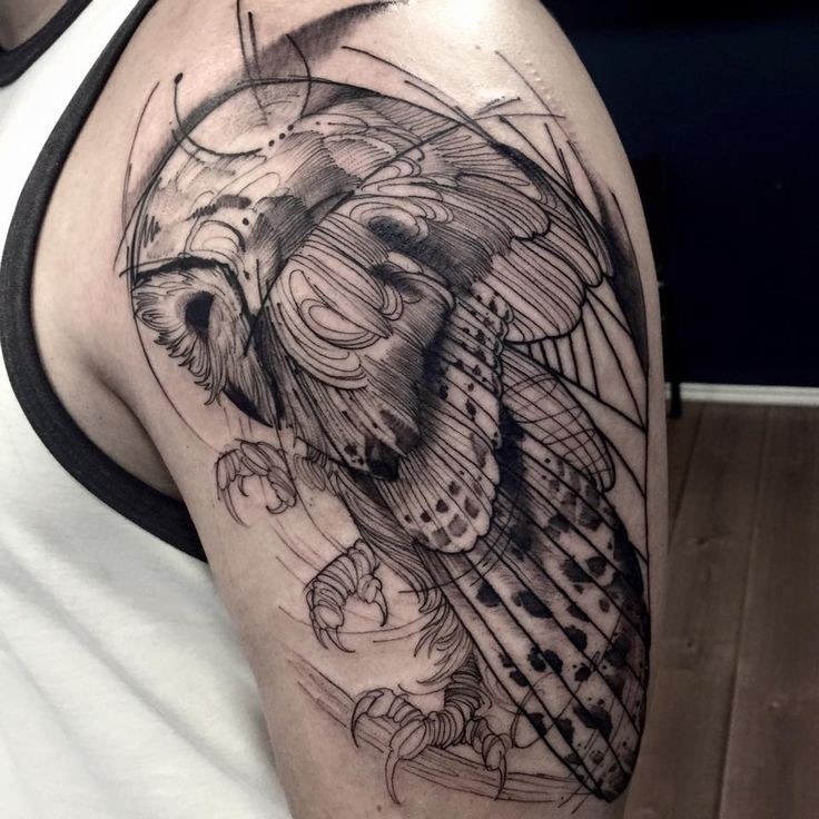 Big black ink sketch style shoulder tattoo of owl