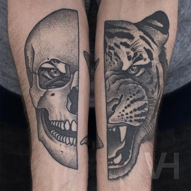 Big black ink tiger and human heads tattoo by Valentin Hirsch