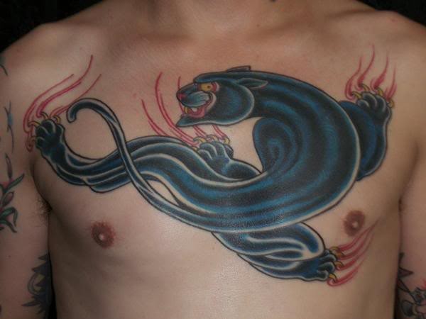 Big black panther tattoo on chest