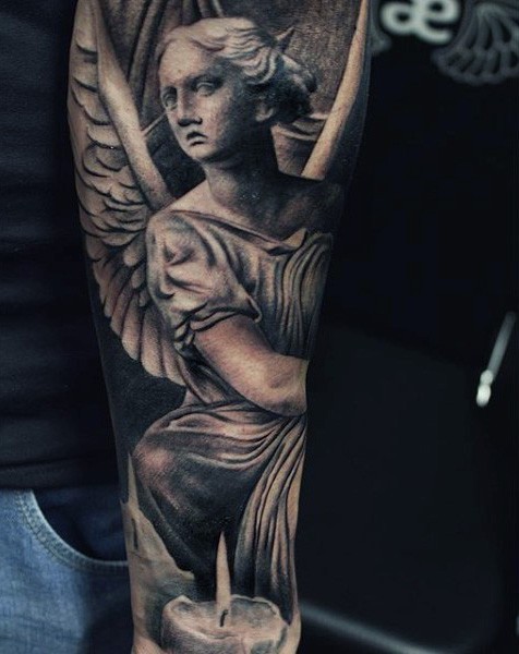 Big colored antic angel statue tattoo with candle