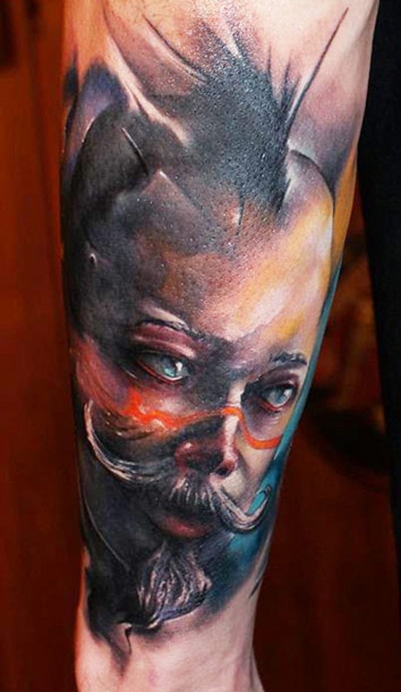 Big colored forearm tattoo of fantasy creature portrait