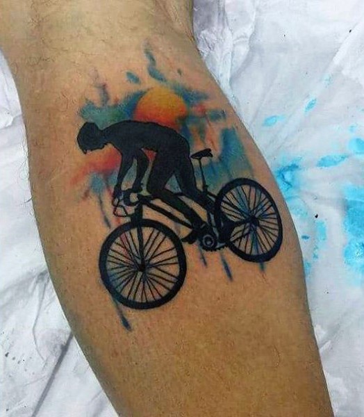 Großer farbiger Vintage Fahrradfahrer Tattoo am Bein