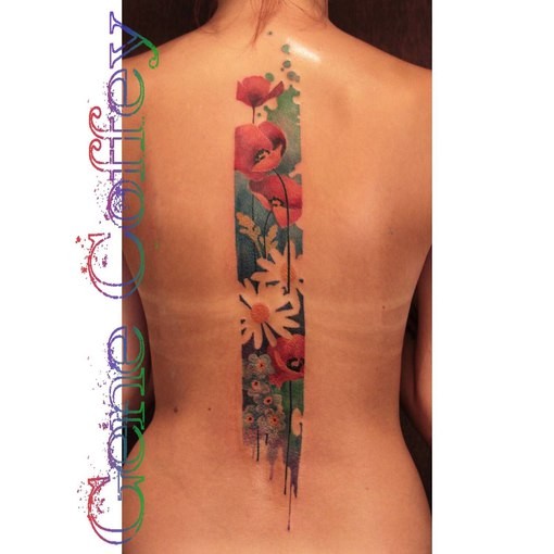 Big colored whole back tattoo of various wildflowers
