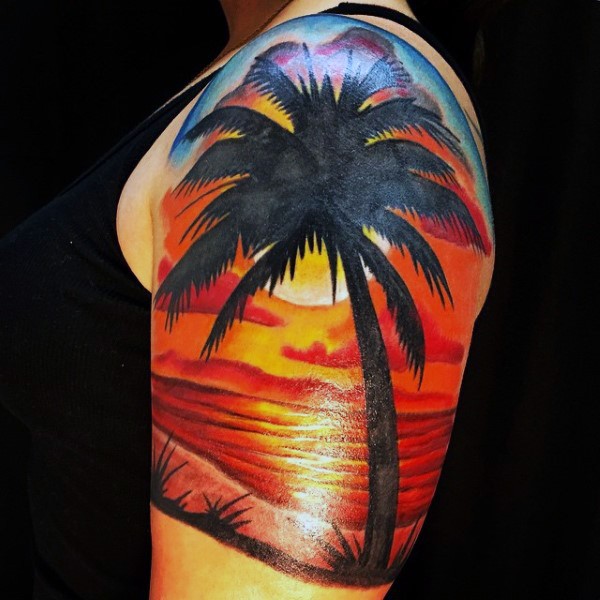Big colorful romantic ocean sunset half sleeve tattoo with palm tree
