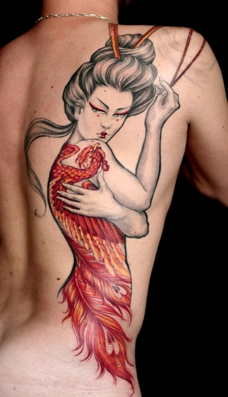 Big cool painted colored geisha tattoo on half back stylized with phoenix bird