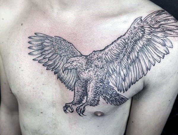 Big detailed black and white flying eagle tattoo on chest