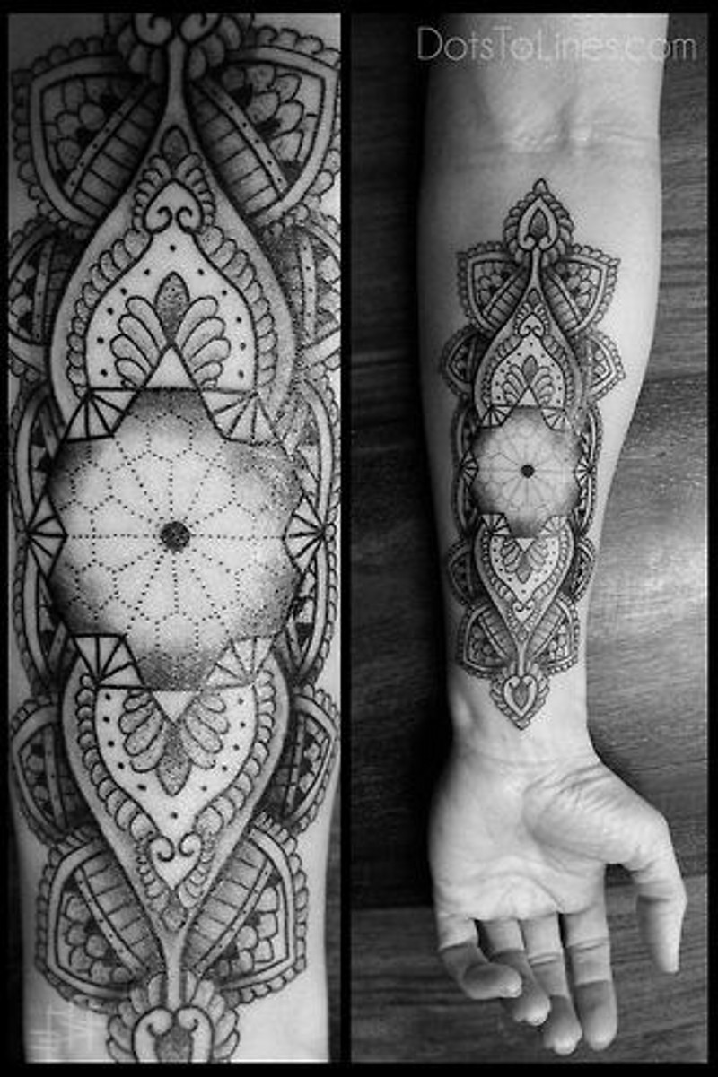 Big detailed black and white Hinduism style tattoo on arm