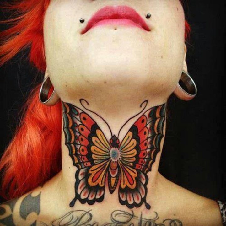 Big ink painted butterfly throat tattoo