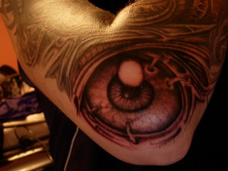 Big magical detailed eye tattoo on elbow